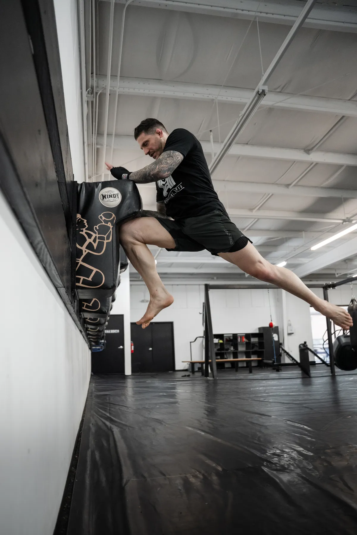 Kickboxing wall-pad training at Mezger Martial Arts
