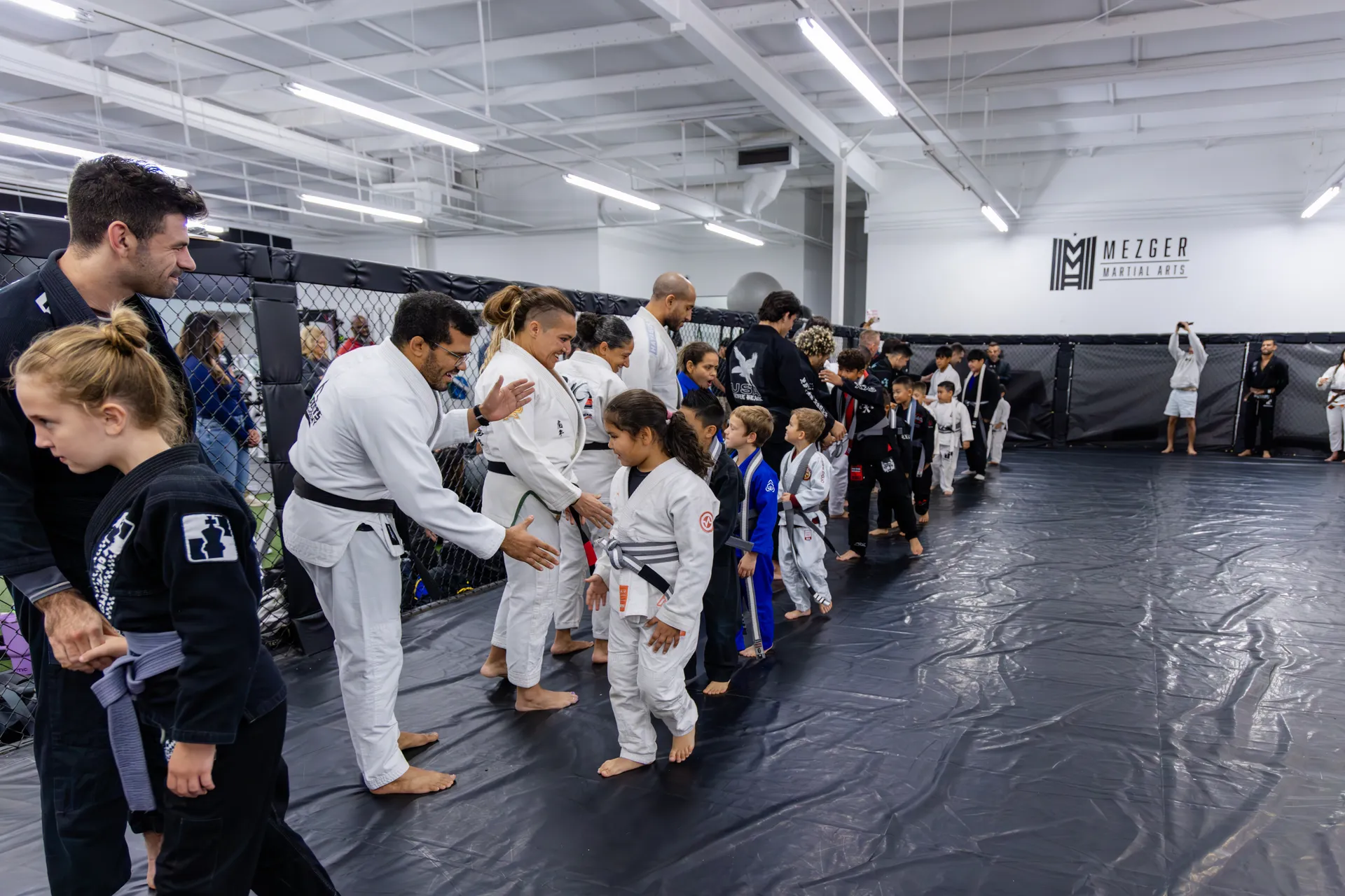 Kids Combat Sports class on the mats at Mezger Martial Arts